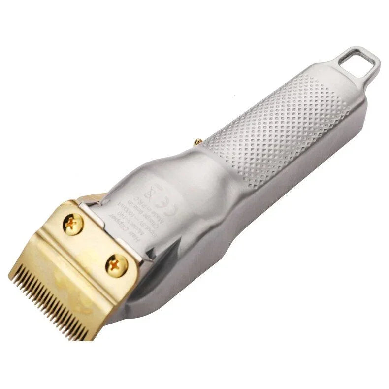 Silver and gold professional hair clipper with textured handle on white background